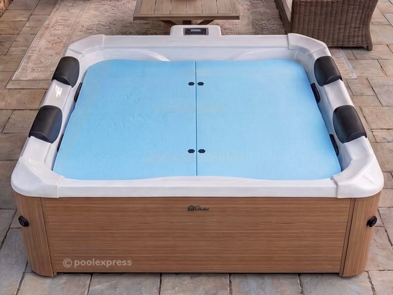 Pool Express - A square hot tub with a light brown wood-style exterior, four black headrests, and an Insulating Spa Cover in light blue, situated on a stone patio.